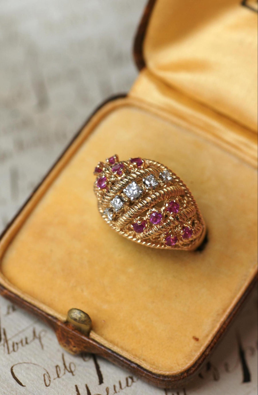 Twisted Ball Ring Diamonds and Rubies on Yellow Gold and Platinum