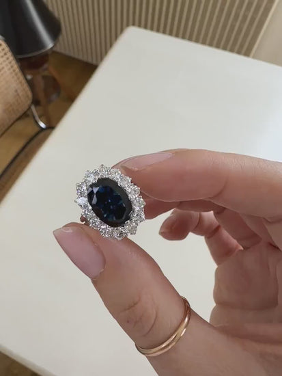 Marguerite Sapphire Ring Surrounded by Diamonds on White Gold