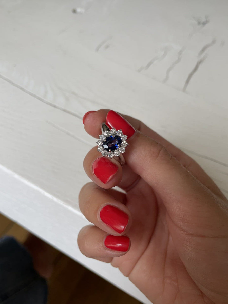 French engagement white gold cluster ring with sapphire and diamonds