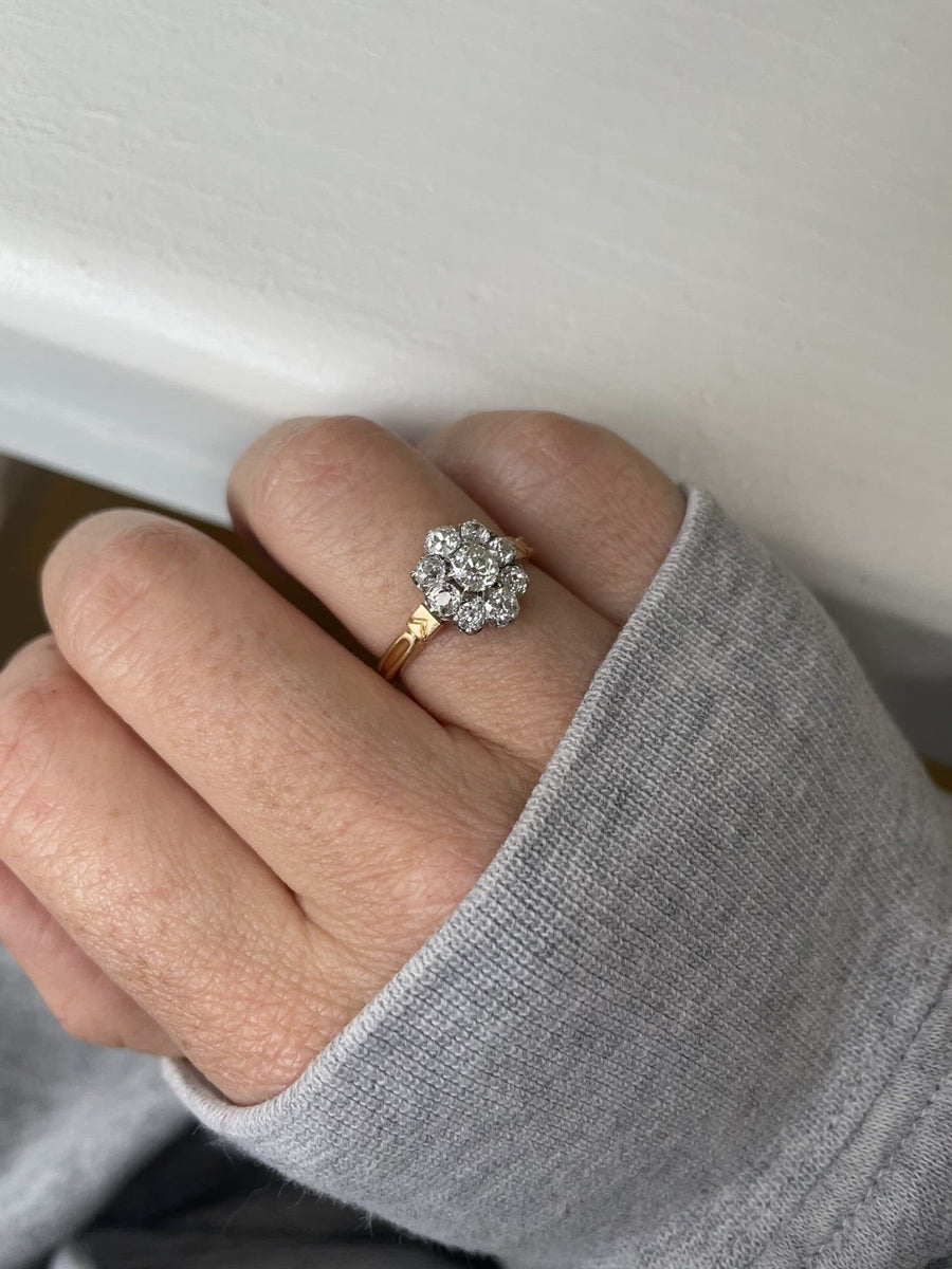 Antique daisy ring with diamonds