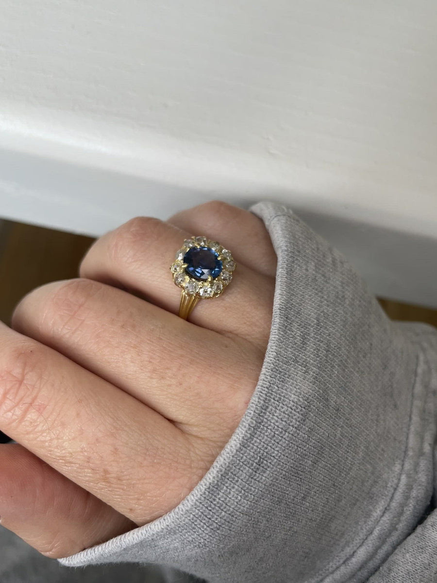 Sapphire daisy ring with diamonds