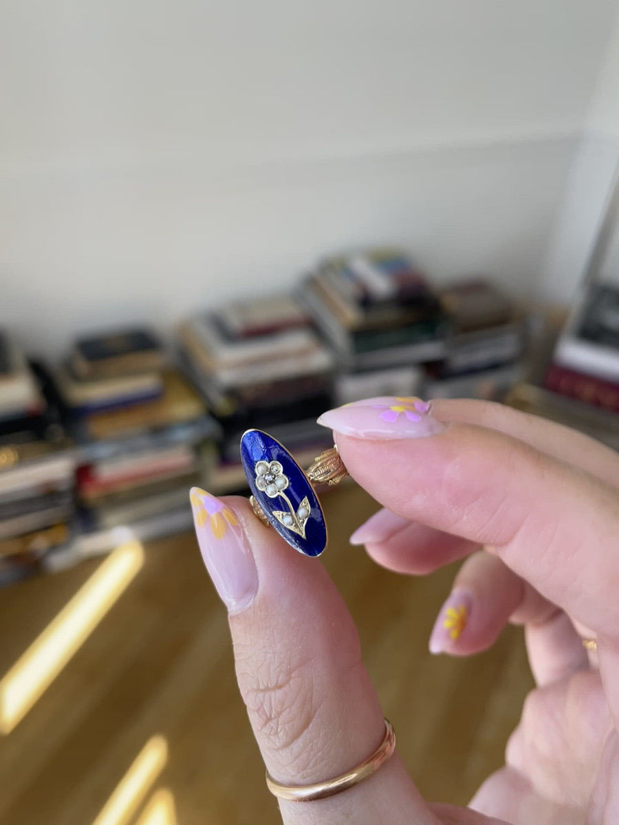 Sentimental flower ring with pearls on enamel