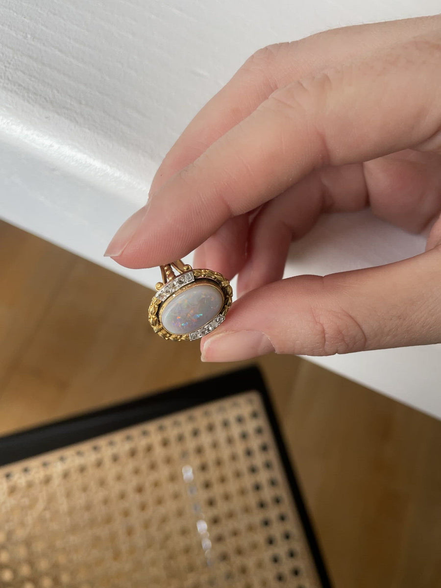 Pompadour opal ring with diamond setting