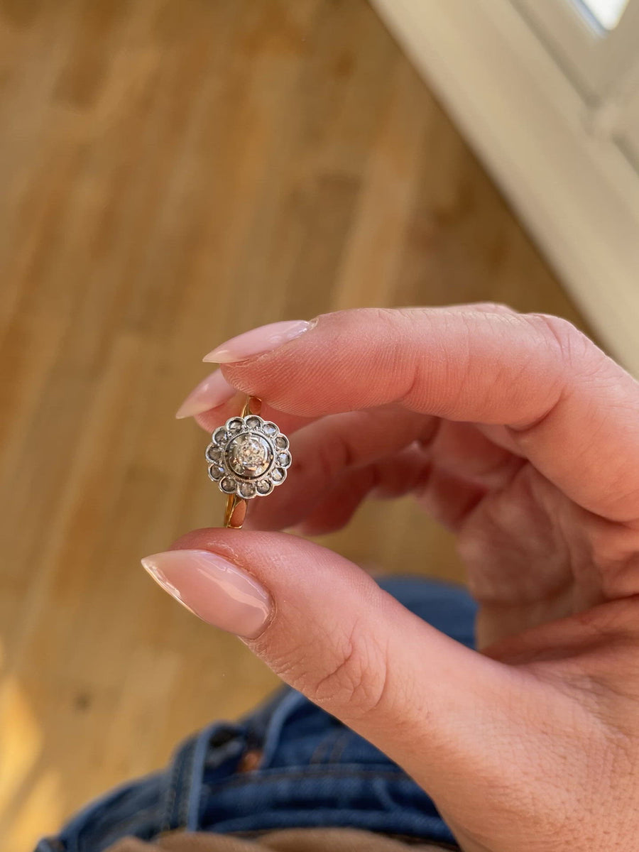 Antique daisy ring with diamonds