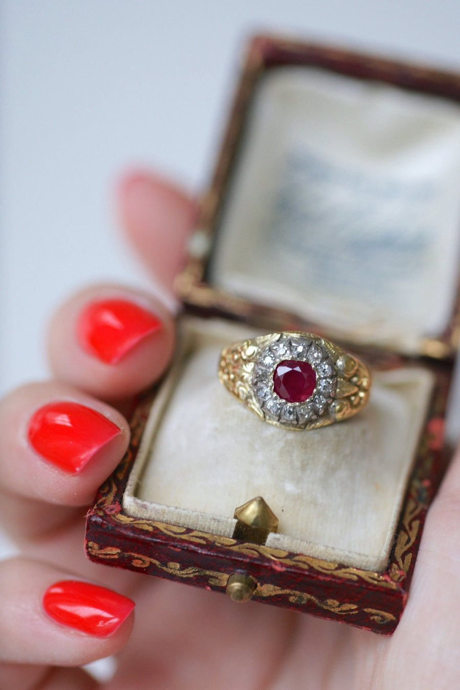 Antique Burmese ruby ring surrounded by diamonds - Penelope Gallery