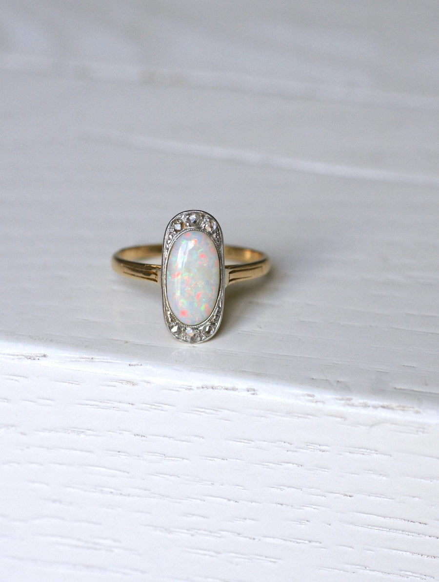 Opal ring surrounded by diamonds - Penelope Gallery