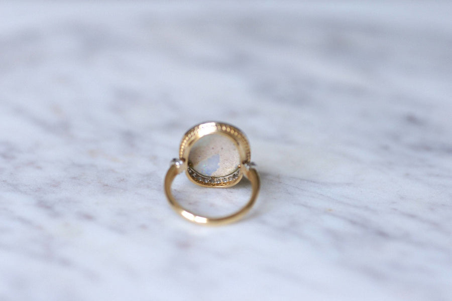 Opal ring surrounded by diamonds - Penelope Gallery