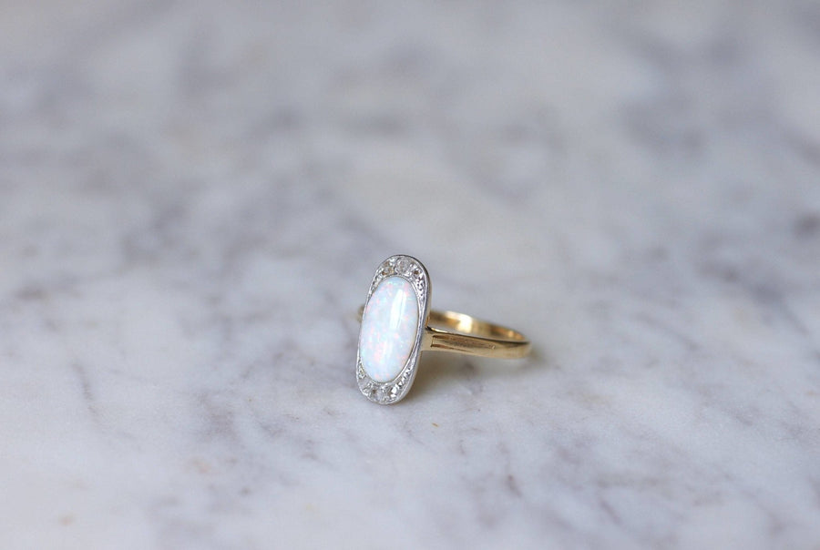 Opal ring surrounded by diamonds - Penelope Gallery