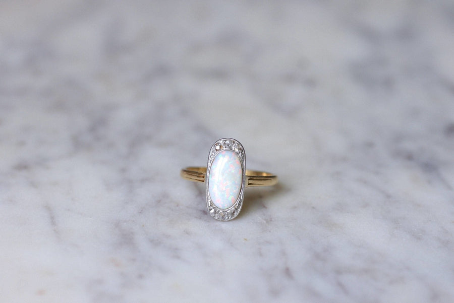 Opal ring surrounded by diamonds - Penelope Gallery