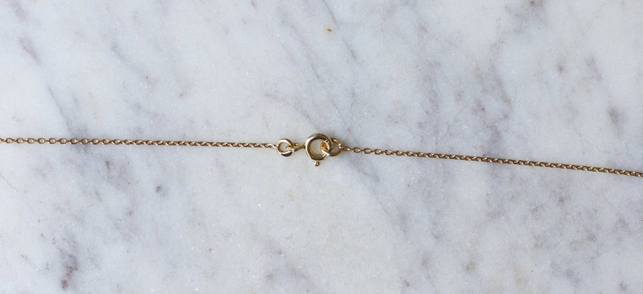 Gold bow and emerald cabochon necklace - Galerie Pénélope