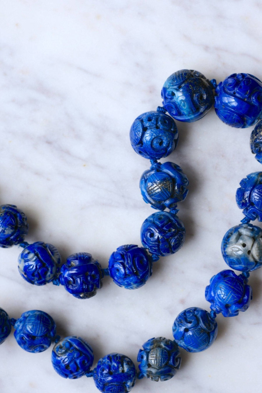 Carved lapis lazuli beads necklace Penelope Gallery