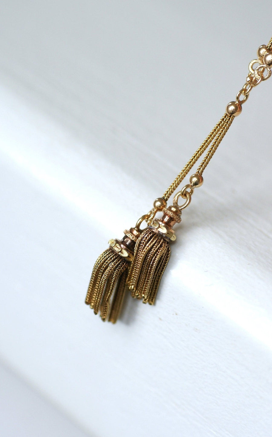 Three gold necklace with pompoms - Galerie Pénélope