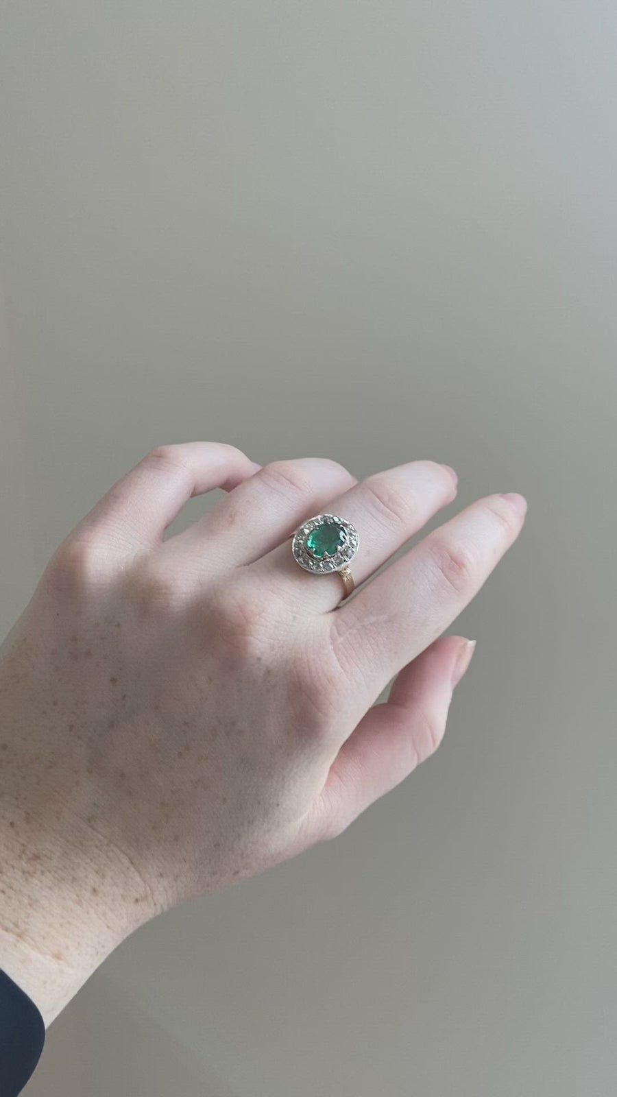Emerald daisy ring with diamonds