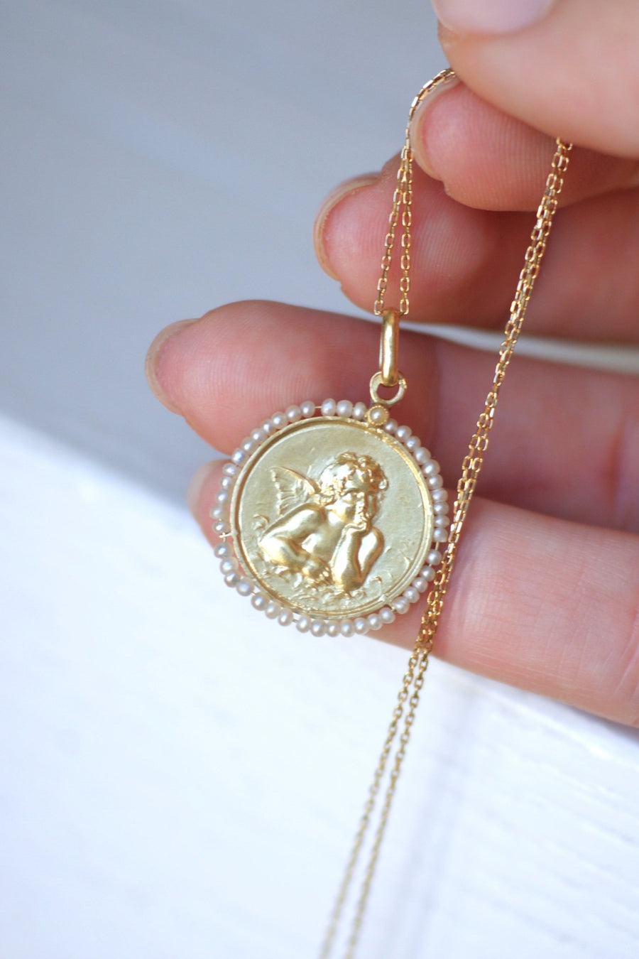 Angel Thinker gold medal with pearls - Penelope Gallery