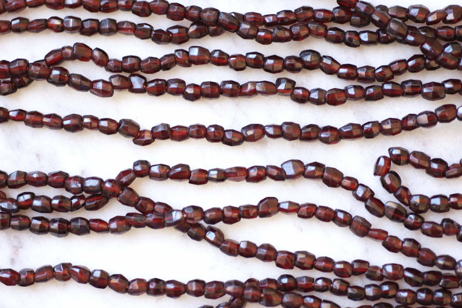 Gold and garnet beads long necklace - Penelope Gallery
