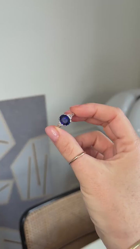 Ring with a 3.50-carat unheated Ceylon sapphire and baguette-cut diamond set in white gold