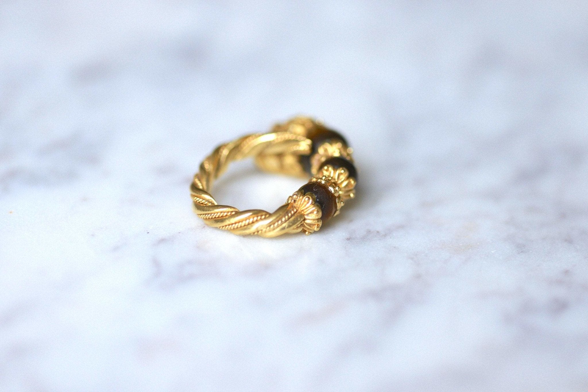 Bague tête de lion Ilias Lalaounis or jaune et quartz oeil de tigre