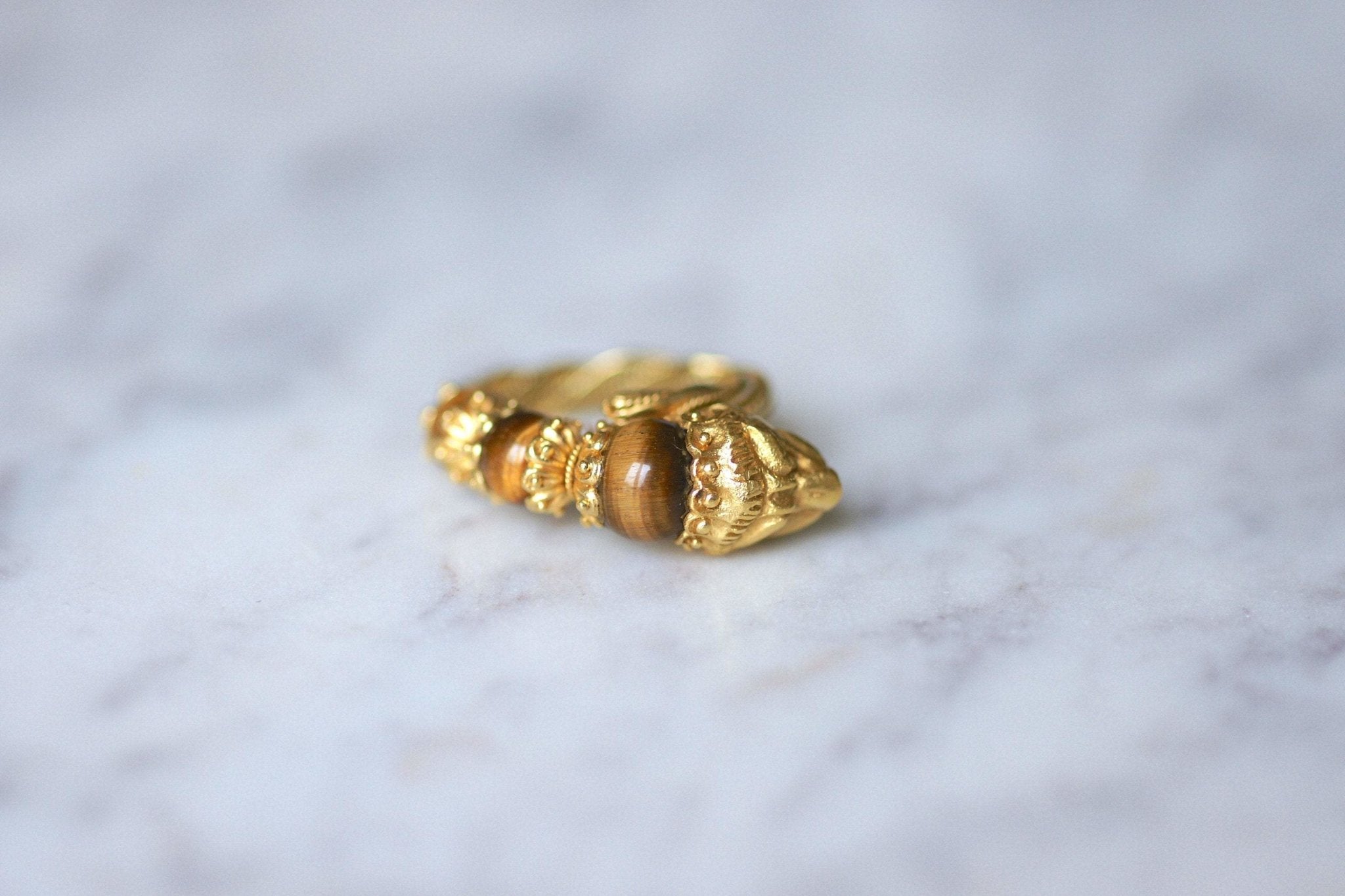 Bague tête de lion Ilias Lalaounis or jaune et quartz oeil de tigre