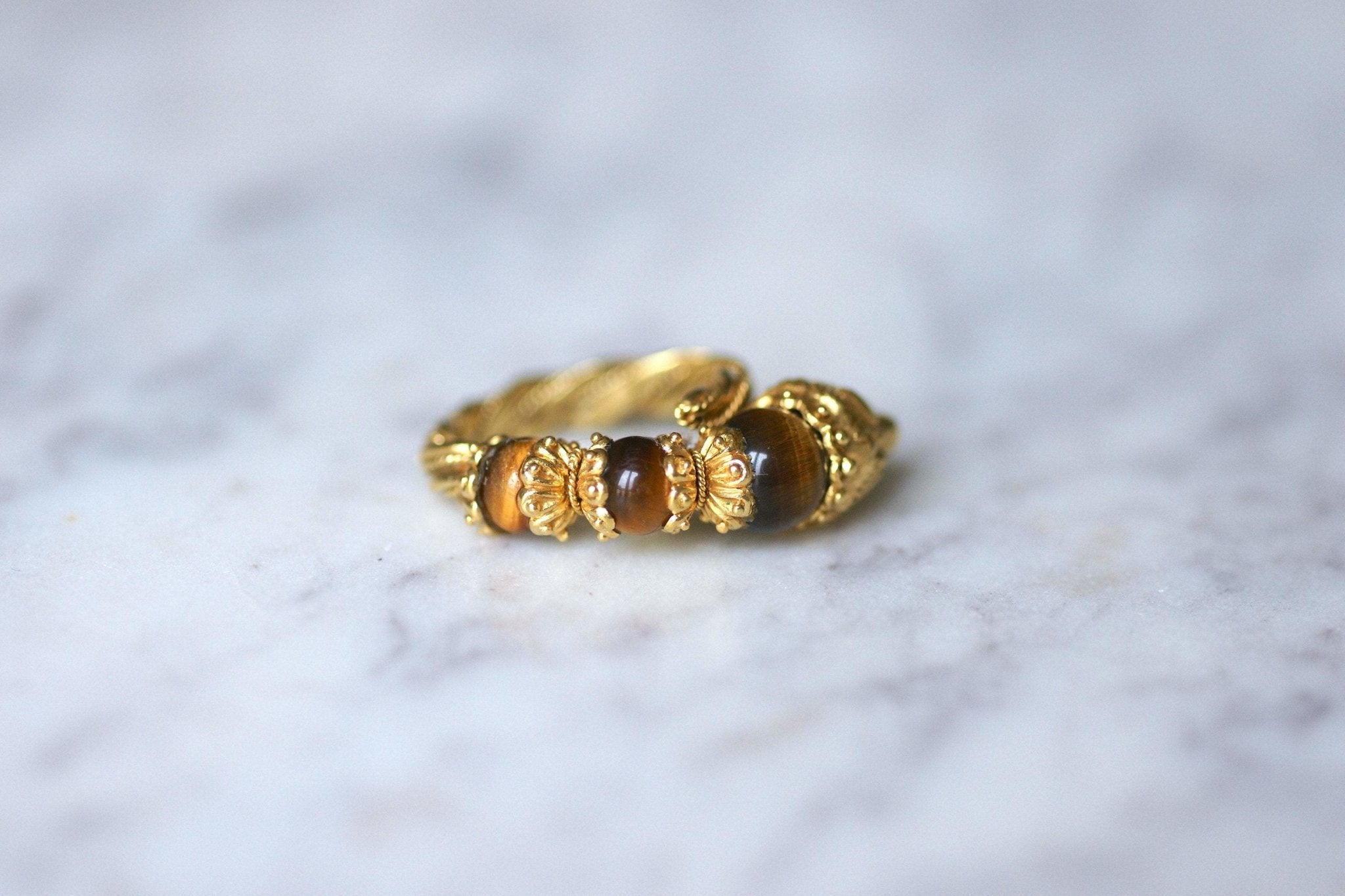 Bague tête de lion Ilias Lalaounis or jaune et quartz oeil de tigre